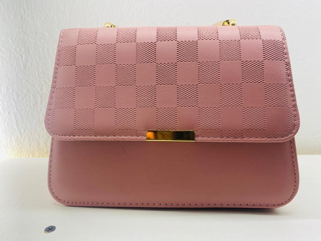 Pink leather handbag